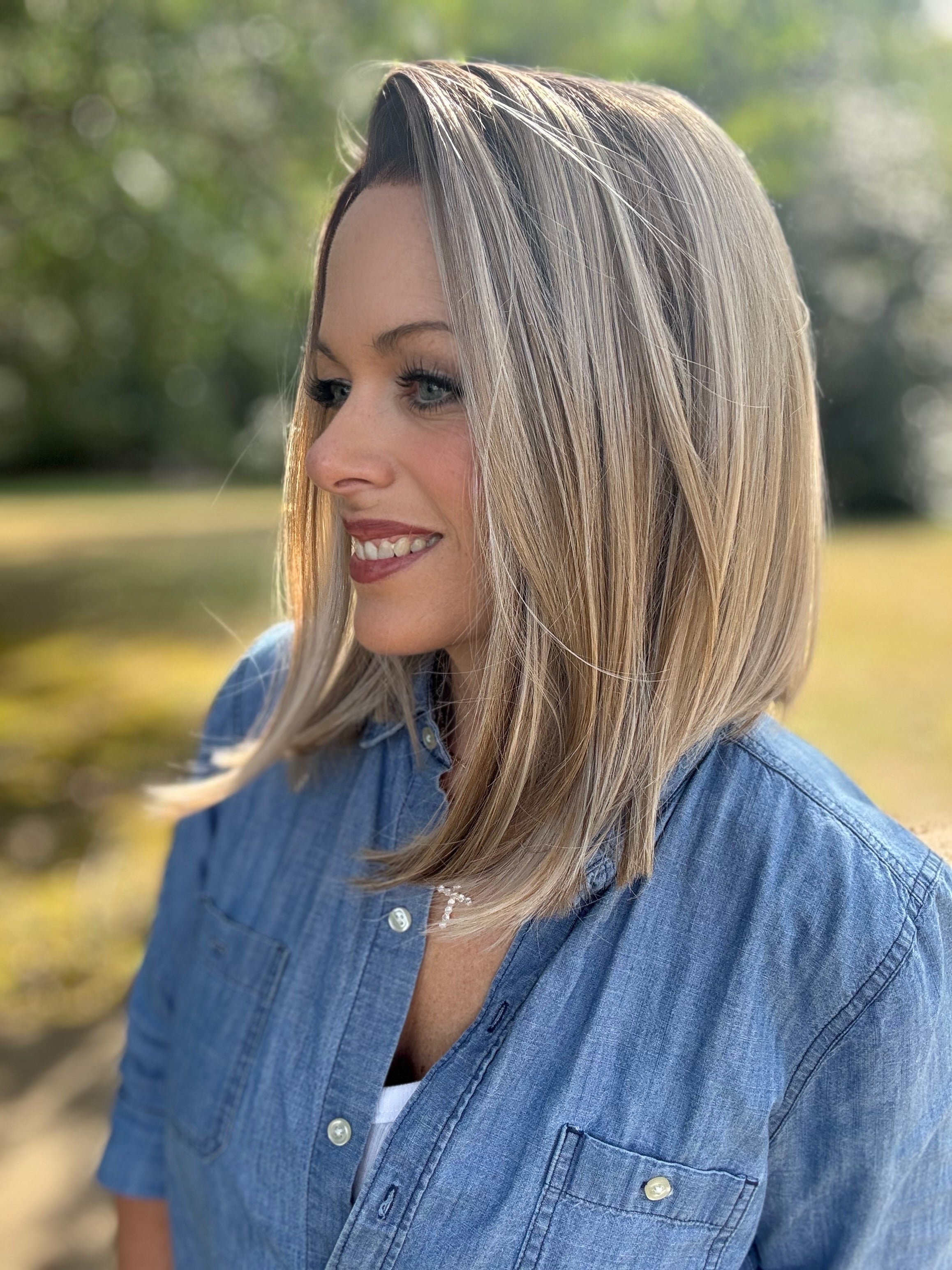 Edie rooted blonde